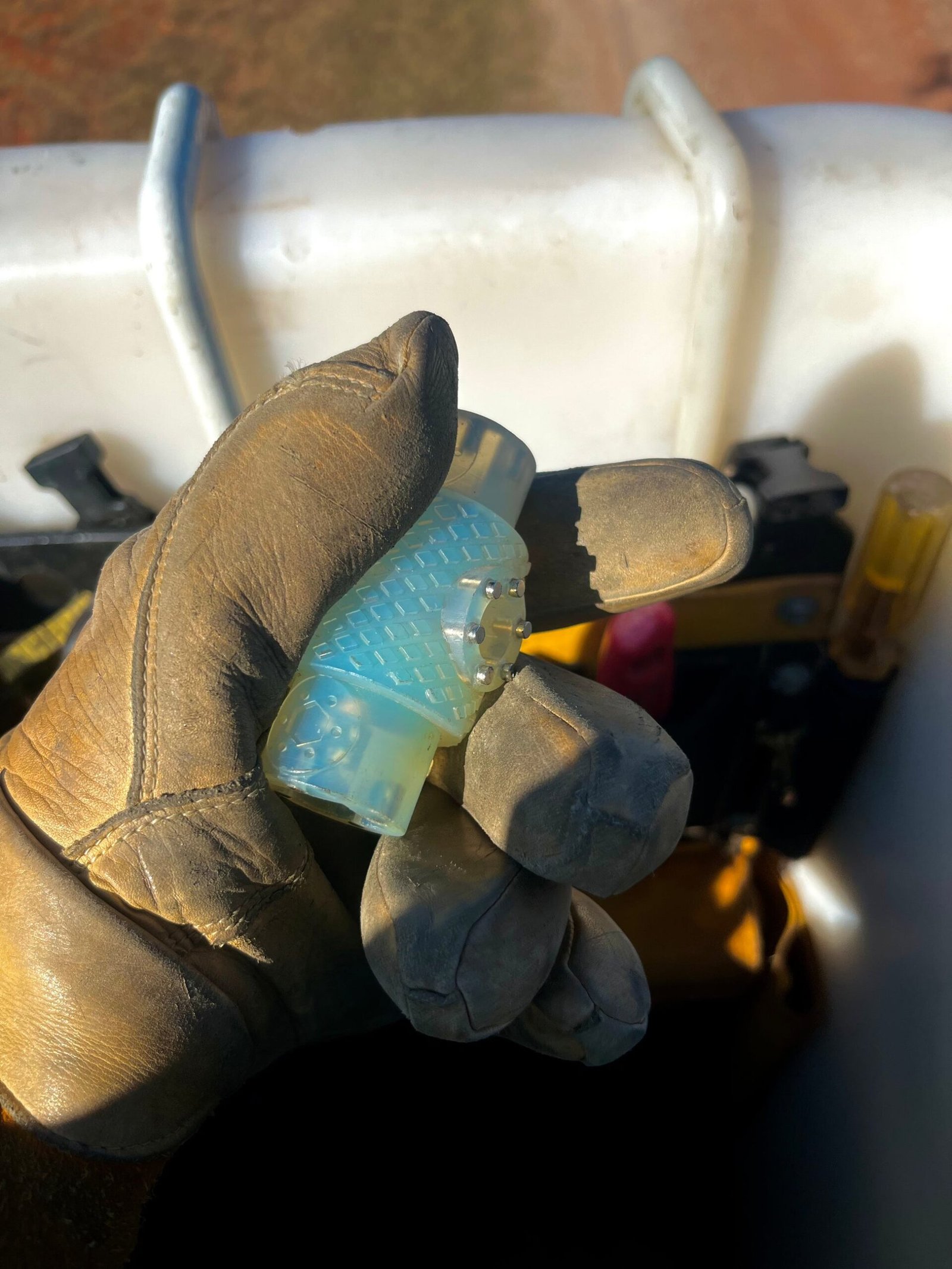 Lineman using the Nut Nob 2.0 tool